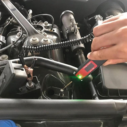 Compact Tool for Everyday Car Maintenance and Checks used to inspect battery and fluid levels during a quick engine bay check