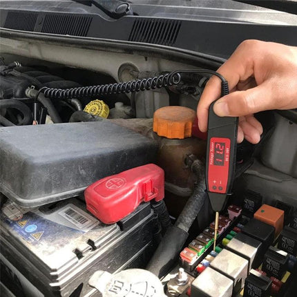 Compact Tool for Everyday Car Maintenance and Checks used to test battery and fluid-related fuses during a quick pre-drive inspection