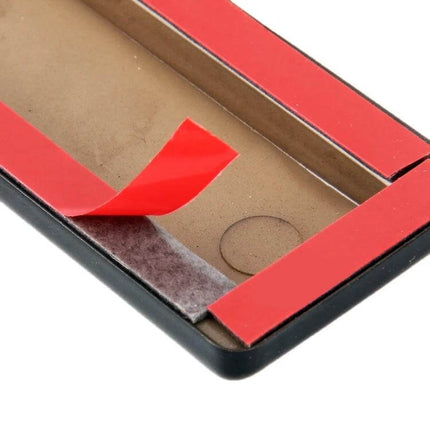 Metal Car Door Edge Anti-Scratch Protection Guards, 4-Pack - close-up of metal guard with red adhesive tape peeled, showing adhesive backing and corner fit