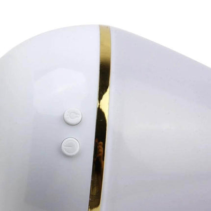 Ultrasonic USB Humidifier Purifier With Aroma Atomizer white close-up showing control buttons and gold trim