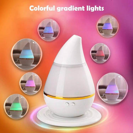 Ultrasonic USB Humidifier Purifier With Aroma Atomizer white teardrop diffuser with colorful gradient lights on desk