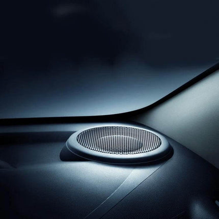 Black 8 Inch Metal Mesh Protective Cover for Car Subwoofers installed over a car dashboard speaker to protect from impacts and moisture