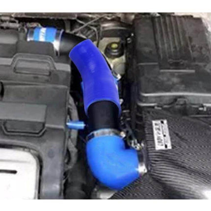 Universal 83 to 89mm 45 Degree Silicone Air Intake Elbow Tube installed in engine bay showing blue silicone 45° elbow routing air to turbo/intercooler