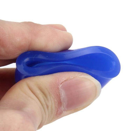 Universal Silicone Air Intake Hose 32mm Inner Diameter — blue silicone hose squeezed between fingers, 32mm ID, heat-tolerant flexible tube