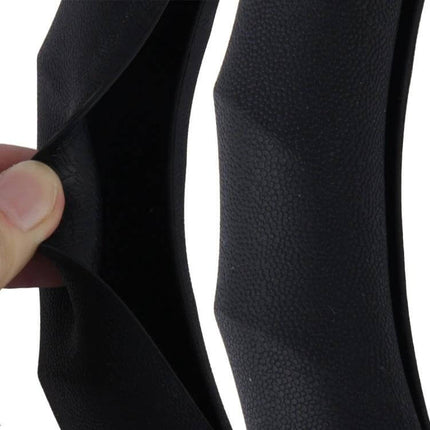 Universal Rubber Steering Wheel Cover with Distorted Lines Texture showing black rubber grip being stretched for fit and textured surface