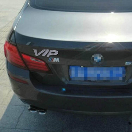 VIP Shape Shining Metal Sticker for Car Decoration on dark sedan trunk showing metallic VIP emblem near tail light
