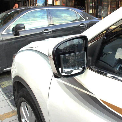 Wide Angle Blind Spot Mirror for Safer Car Visibility attached to vehicle side mirror showing expanded field of view for lane changes and parking