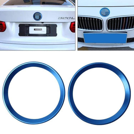 BMW 5 Series Decorative Steering Wheel Logo Ring blue metallic trim shown on trunk, grille and two rings