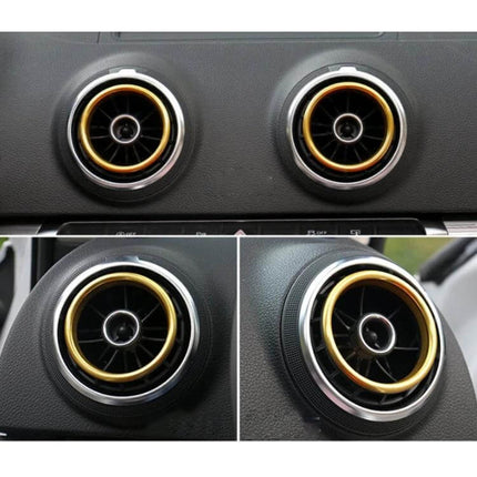 Aluminum Alloy Decorative Rings for Audi A3 Air Vents installed on dashboard, gold inner ring and silver outer trim, rust-proof finish