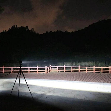 5 Inch Off Road Two Bar LED Work Light Waterproof Yellow shining bright beam on night trail and wooden railing, tripod set up for distance illumination