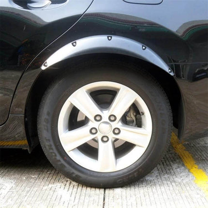 Universal Black Rubber Fender Flare Stickers, 58cm Long installed on car wheel arch to protect paint from road debris
