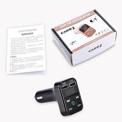 B2 Dual USB Bluetooth FM Transmitter Car Kit Silver shown with packaging, manual and dual-USB car FM transmitter for hands-free calls and music