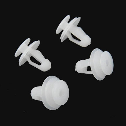 Universal Car Door Panel Replacement Clips, 100-Piece Set - white plastic door panel fasteners laid out on black background