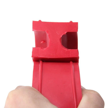 D Type Car Shock Absorber Spring Bumper Red for Everyday Driving - red D-shaped rubber bumper held by hand showing cutouts for shock absorber alignment