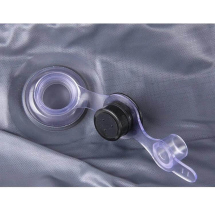 Inflatable Car Mattress for Travel, Camping, and Road Adventures valve detail showing cap and seal on grey inflatable fabric