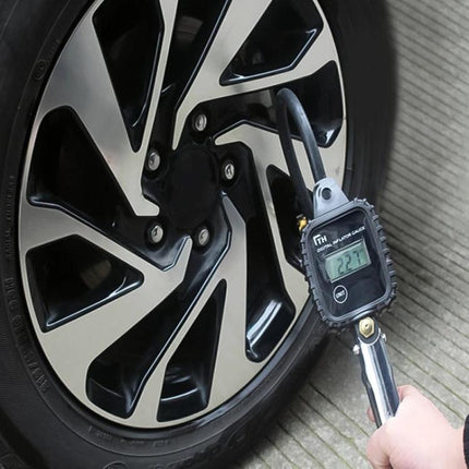 Essential Tire Pressure Gauge for Safe Daily Driving measuring car tire pressure before a commute for accurate readings