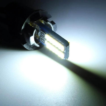 2-Pack T10 W5W LED Car Interior Reading Lamp 6000K glowing cool white LED bulb close-up for map and cabin lighting