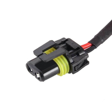 Xenon HID Headlight Bulbs Pair For Night Driving Set - close-up of waterproof 2-pin wiring connector with red and black leads and yellow seal