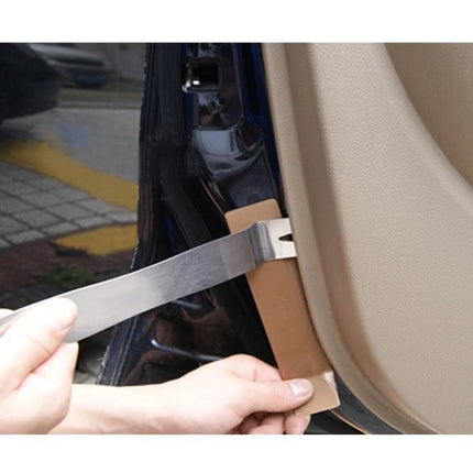 FatMax Steel Wrecking Bar for Everyday Home Repairs — pry tool separating car door trim with protective pad for DIY home and auto tasks