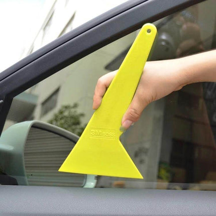 Versatile Window Film Squeegee for Car, Home, and Office Use - yellow PVC squeegee removing bubbles on car window