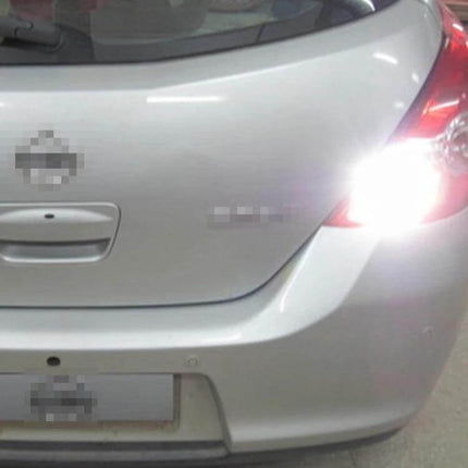 White LED Car Brake Light for Vehicles Easy Install shown on rear of a hatchback with bright white brake illumination and easy-fit replacement