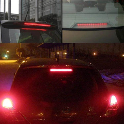 14 LED Red Car Third Brake Light For Everyday Vehicle Use - slim third brake LED bar showing bright red illumination on hatchback at night