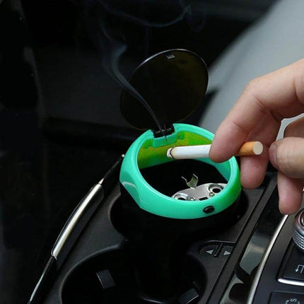 Portable Green Car Trash Bin with Ashtray for Everyday Use shown in car cup holder with removable ashtray and lit cigarette