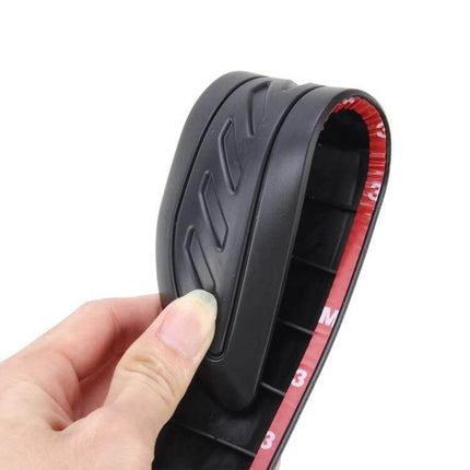 Universal Car Bumper Guard Protector Strip Set for Vehicles - black peel-and-stick bumper protector held by hand, textured surface, red adhesive strip
