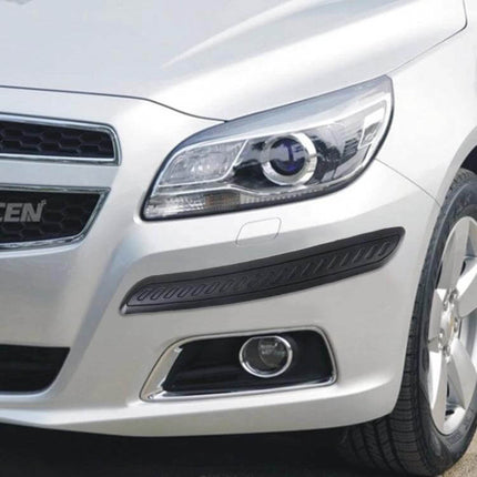 Universal Car Bumper Guard Protector Strip Set for Vehicles shown installed on a white car front bumper, peel-and-stick black protector