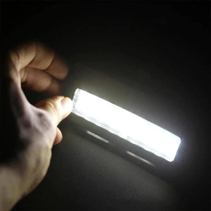 White LED Vanity Mirror Lights For BMW Easy Plug And Play Kit - bright 18 SMD-3528 LED vanity mirror strip shown in hand for F10 F11 F01 F02 F03 F04