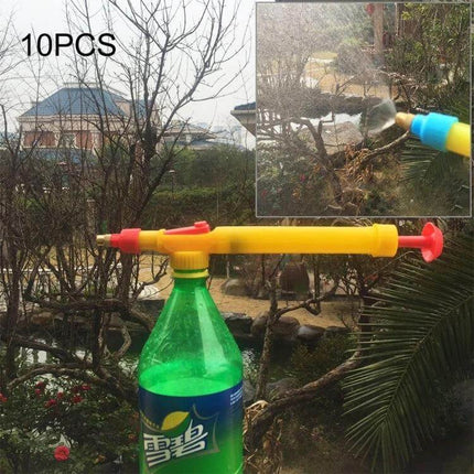 Plastic Bottle Sprayer Set, 10 Pack For Garden Watering attached to a standard beverage bottle spraying plants in a garden