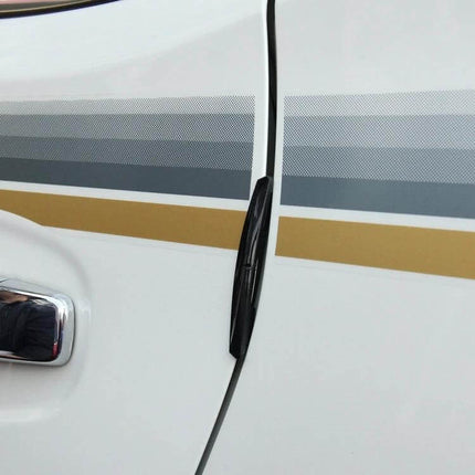 Set of 4 Black Rubber Car Side Door Edge Protection Guards installed on white car door to prevent dings and scratches