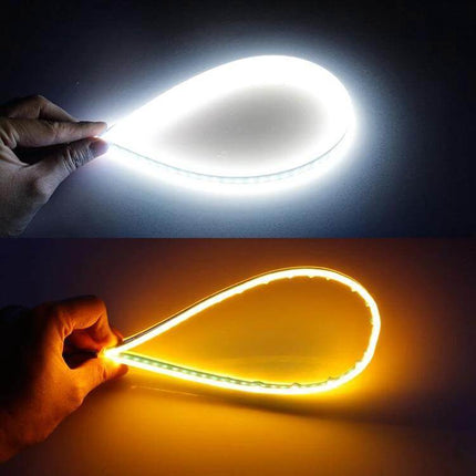 2 Pack 30cm Ultra-Thin Car Turn Lights and Running Lights showing white and amber LED flexible slim modules held by hand for signaling and daytime running lights