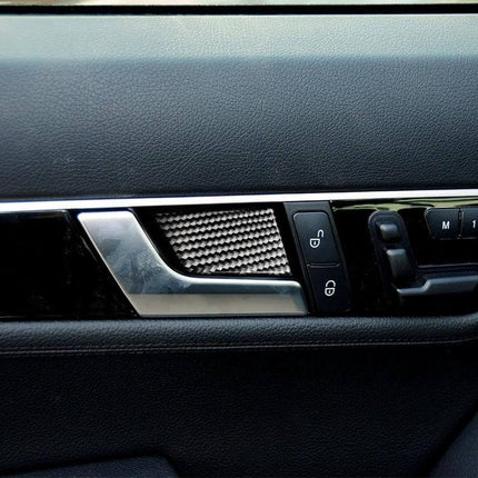 Carbon Fiber German Flag Car Door Decorative Sticker for Mercedes-Benz on black Mercedes-Benz interior door panel, carbon fiber German flag trim