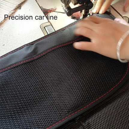 Comfortable Anti-Skid Children's Car Safety Seat Cushion shown with hands sewing mesh storage pocket and red stitching to prevent seat wear and slipping