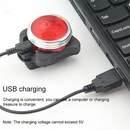 COB Bicycle Light USB Rechargeable Headlight and Taillight showing red taillight USB charging from laptop, compact aluminum body