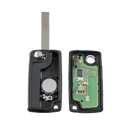 Peugeot 2-Button Remote Key for Vehicle Access Control showing opened housing, battery and circuit board replacement remote