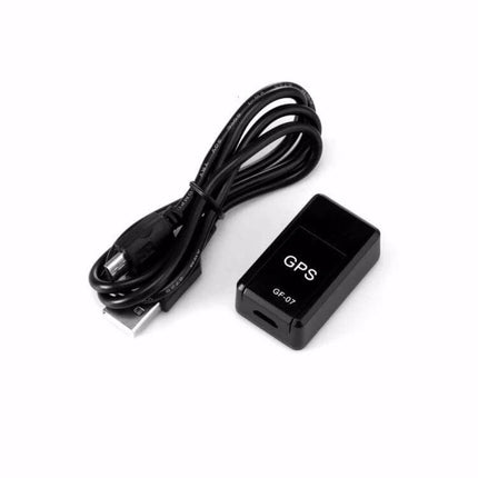 Mini Magnetic GPS Tracker for Real-Time Vehicle Location - compact black GPS unit with USB charging cable