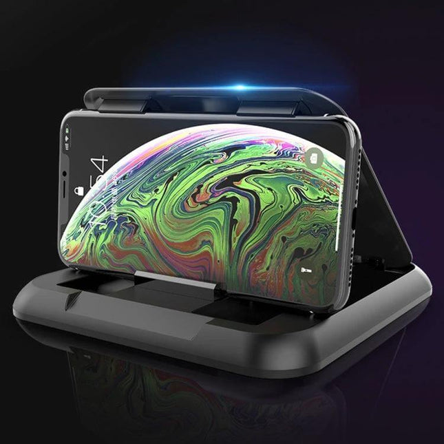 Carbon Fiber Texture Silicone Car Phone Holder for Smartphones showing a smartphone secured on a dashboard stand during driving