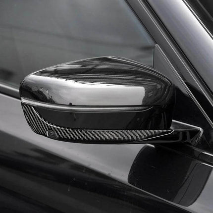 Carbon Fiber Decorative Stickers for BMW Rearview Mirrors - close-up of black BMW mirror with carbon fiber sticker accent