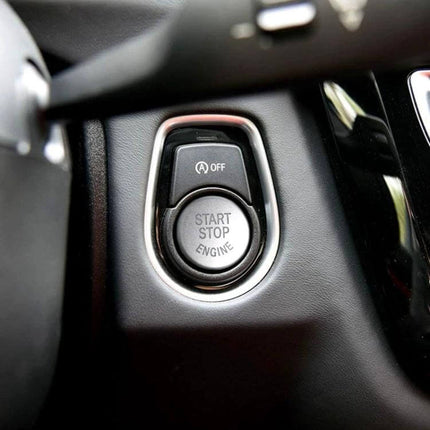 BMW Engine Start Push Button Cover for G and F Chassis Models shown installed around BMW start stop engine button protecting and enhancing dashboard
