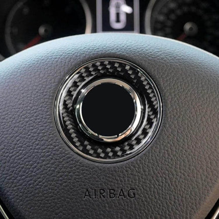 Carbon Fiber Steering Wheel Decorative Ring for Volkswagen Cars installed on steering wheel center showing carbon fiber texture and airbag label