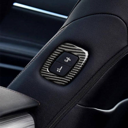 Carbon Fiber Decorative Sticker for Toyota Camry Seat Adjustment on black leather seat panel, close-up of carbon fiber finish