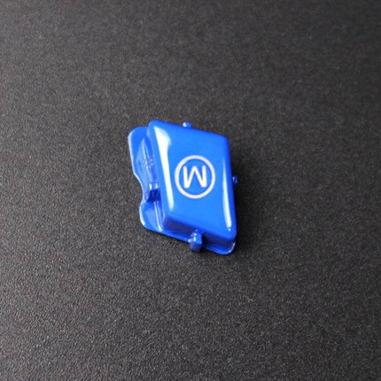 Decorative Wheel M Trim Cover for BMW 3 Series in Blue - close-up of blue M wheel trim cover on dark background