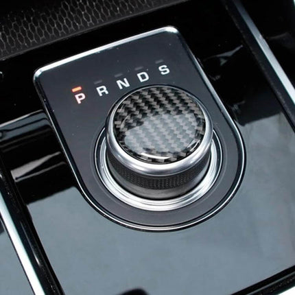 Carbon Fiber Car Gear Decorative Sticker for Jaguar F-PACE applied to rotary gear knob showing carbon fiber texture and glossy console