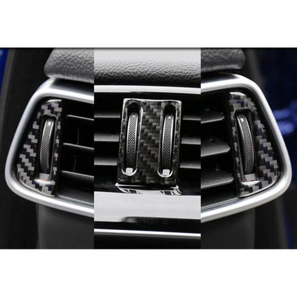 Carbon Fiber Decorative Sticker for Jaguar F-PACE Air Outlet on dashboard air vent close-up, carbon fiber texture