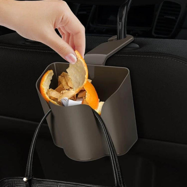 Car Back Seat Hook for Trash Storage and Organization hanging on headrest holding orange peels and trash for tidy car
