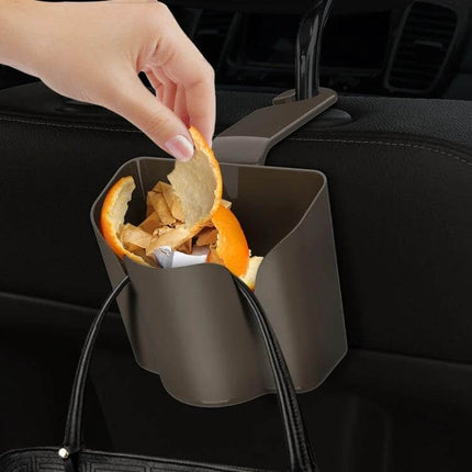 Car Back Seat Hook for Trash Storage and Organization hanging on headrest with trash bag and snacks inside