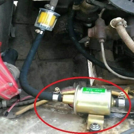 Universal Car Inline 12V Low Pressure Fuel Pump for Vehicles installed inline in engine bay with clear filter and mounting bracket