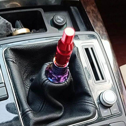 Aluminum Adapter for Car Gear Shift Knobs, 12x1.25 Thread installed on red anodized shift knob in car interior